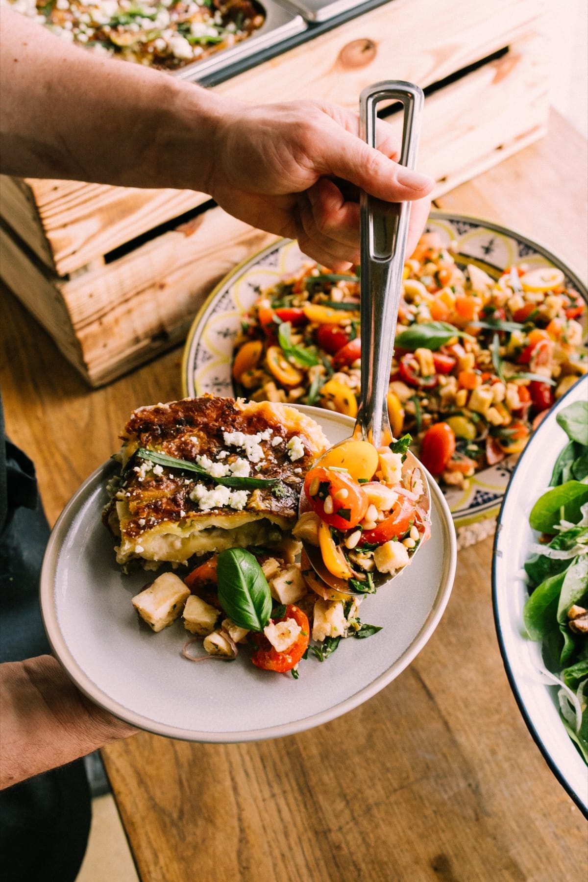 A plate from the DIS Chef’s Menu: lasagne and a fresh grain salad, served up at the buffet